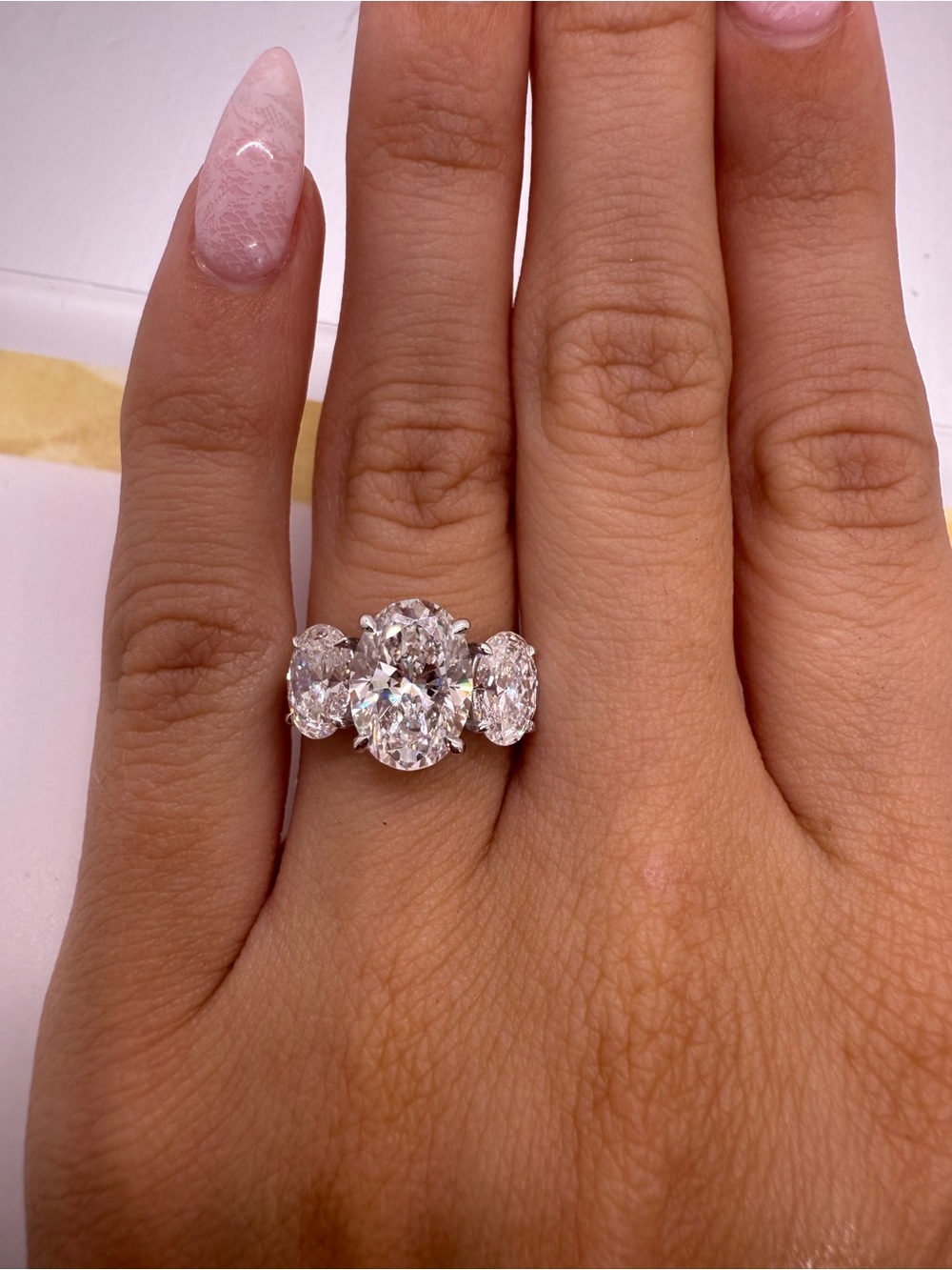 3.05 carat e vs1 oval lab diamond three stone engagement ring white gold